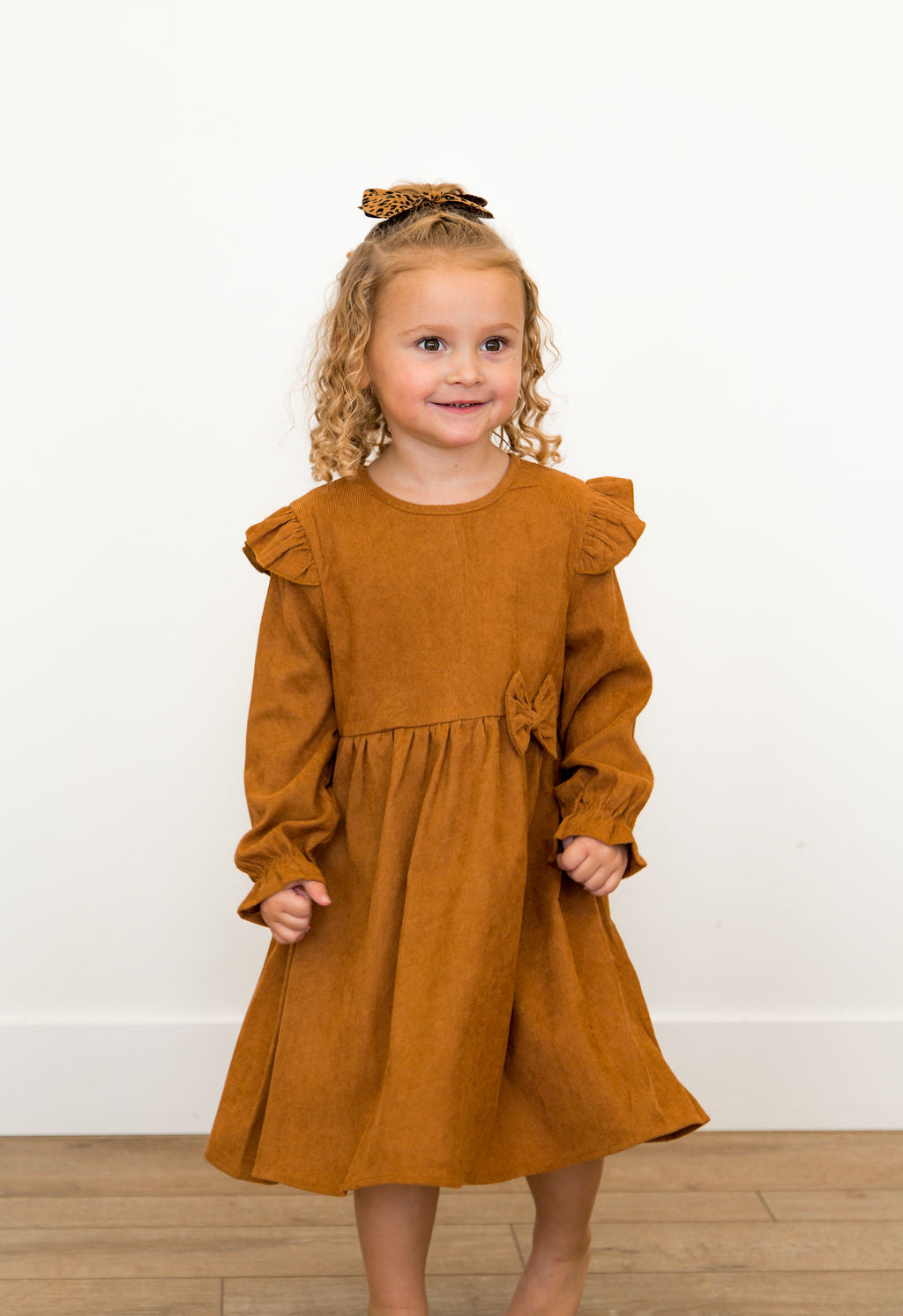 Rust Corduroy Dress with Ruffle Shoulders/accent bow