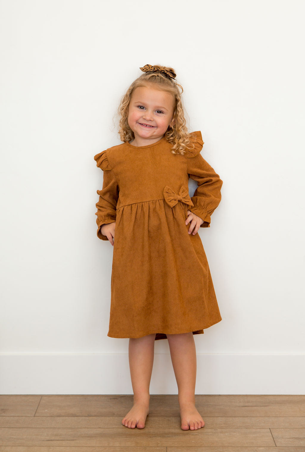 Rust Corduroy Dress with Ruffle Shoulders/accent bow