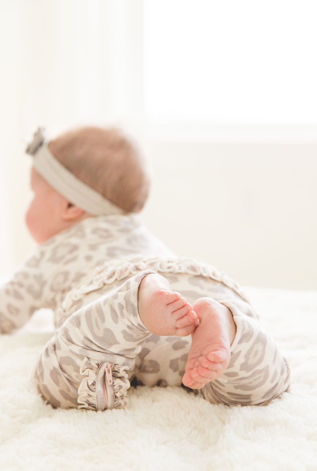 Baby Girl Leopard Bamboo Ruffle Sleeper with 2 way zipper and fold over hands and feet