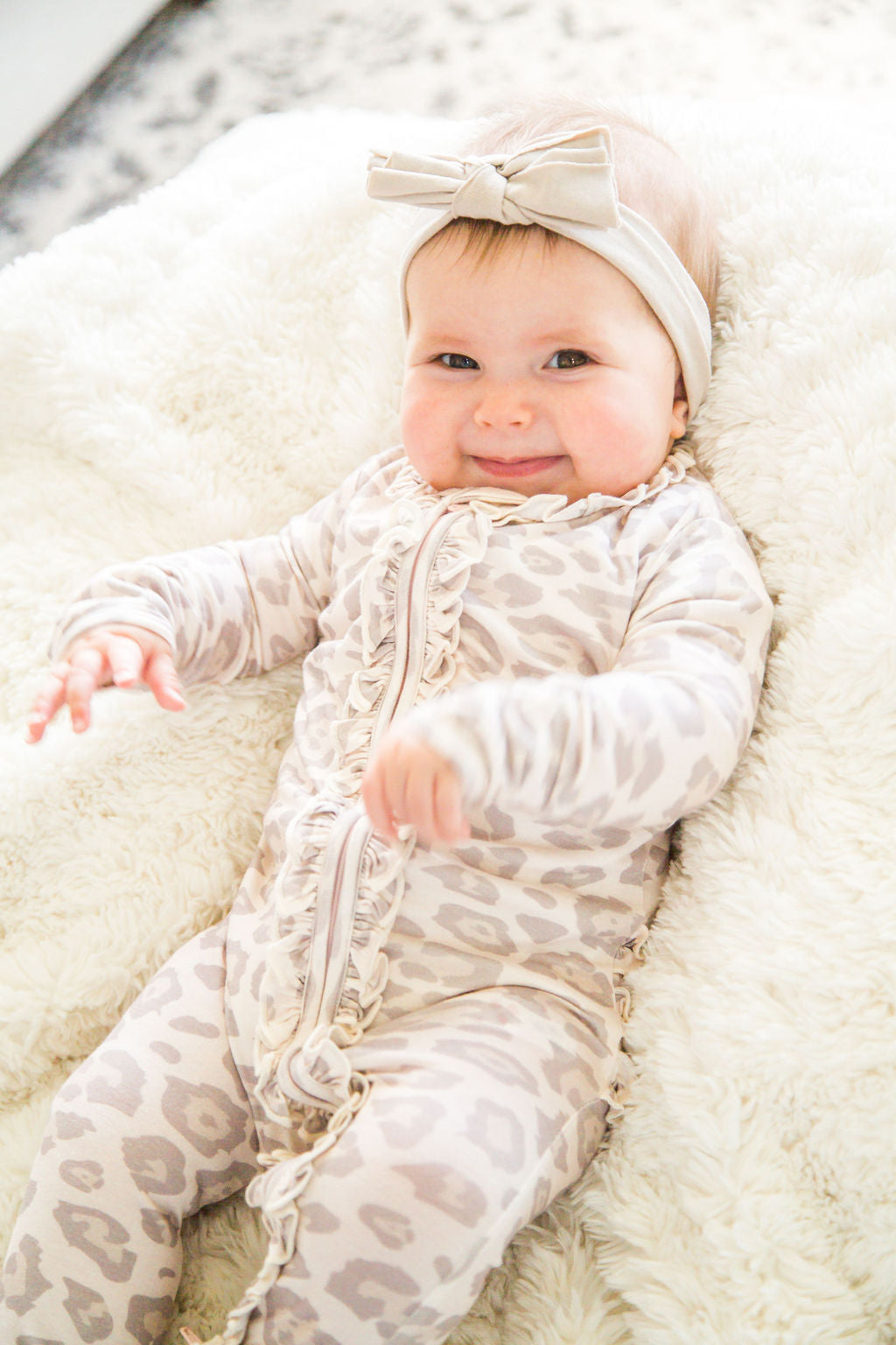 Baby Girl Leopard Bamboo Ruffle Sleeper with 2 way zipper and fold over hands and feet